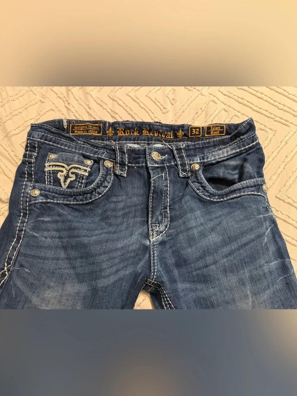 Rock Revival men’s Blue Bootcut Jeans with Embroidered Back Pockets